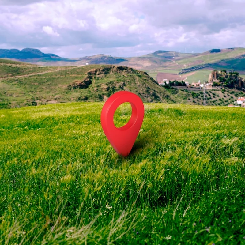 Symbol lokalizacji z tłem krajobrazowym