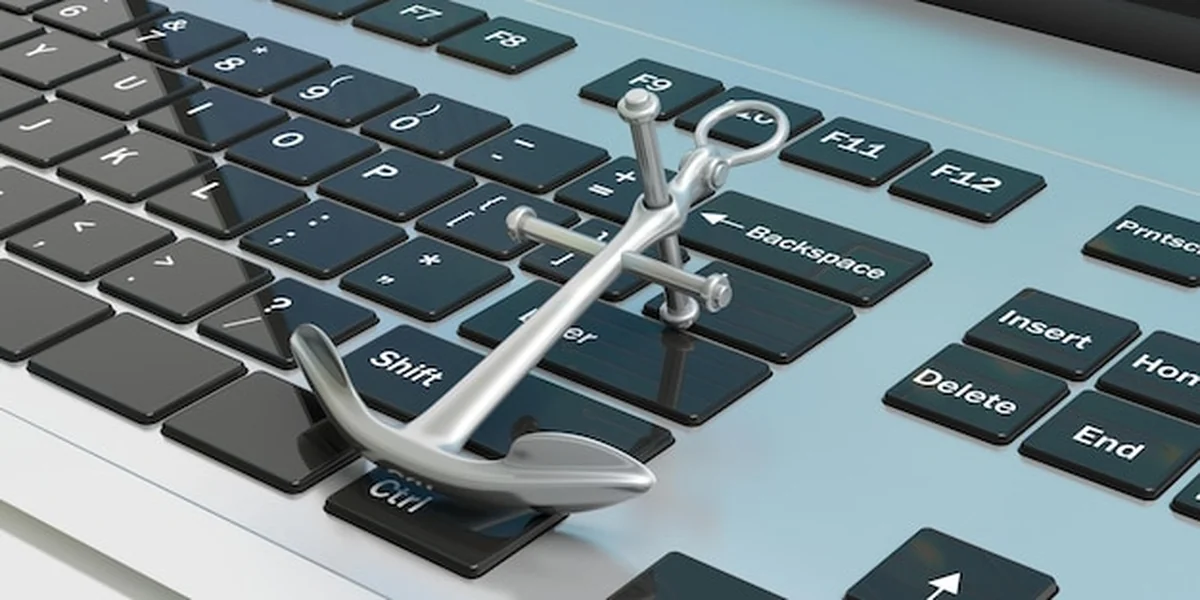 Metalowa błyszcząca kotwica statku na ilustracji 3D klawiatury komputera